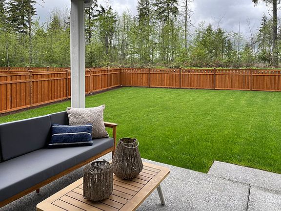 Covered Rear Patio and Fenced Backyard