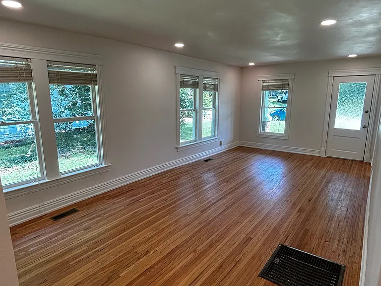Large living room, all wood floors in the house have just been refinished