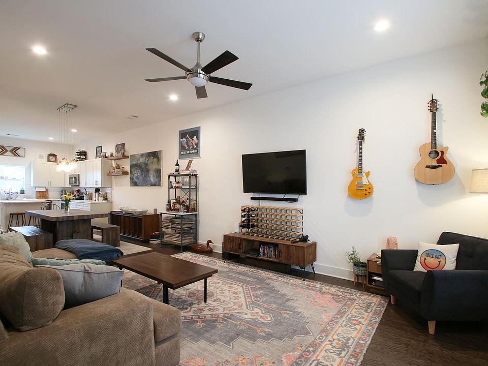 Large open living room with plenty of room for multiple furniture arrangements.