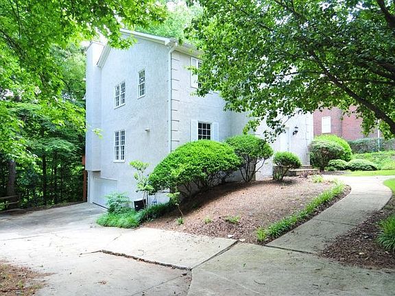Long Driveway and 2 Car Garage