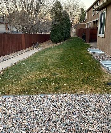 Back of home with additional space to relax.