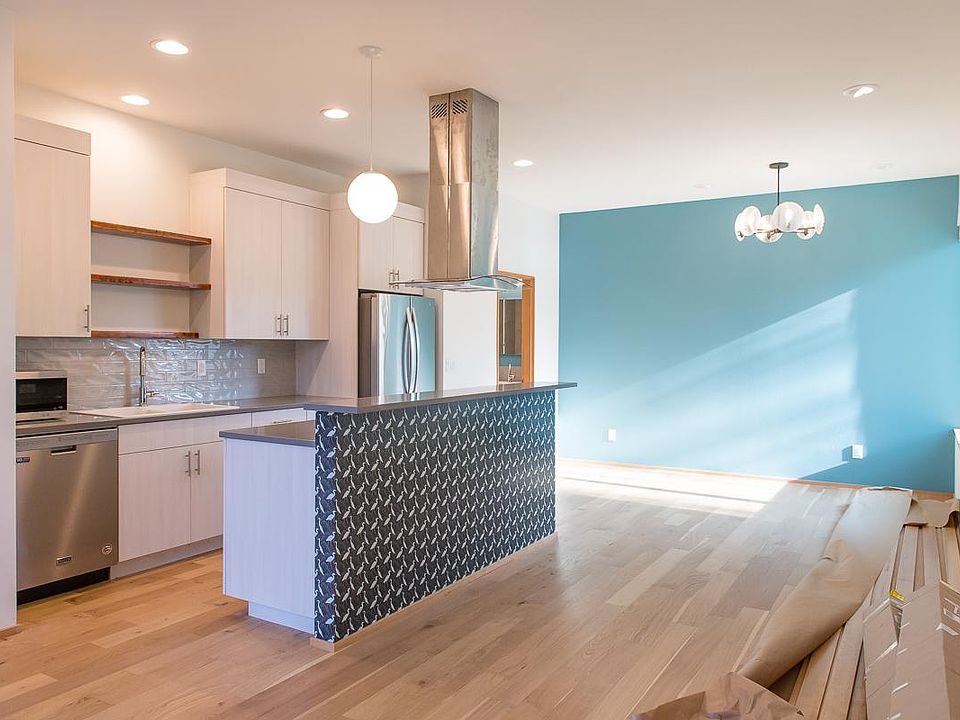 Opening layout of Kitchen, living and dining room.