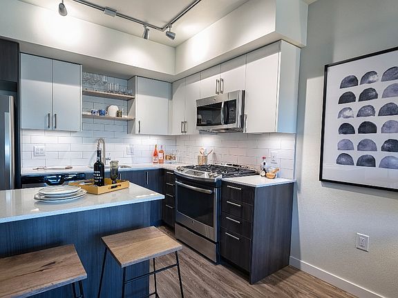 Beautiful finishes include subway tile backsplash