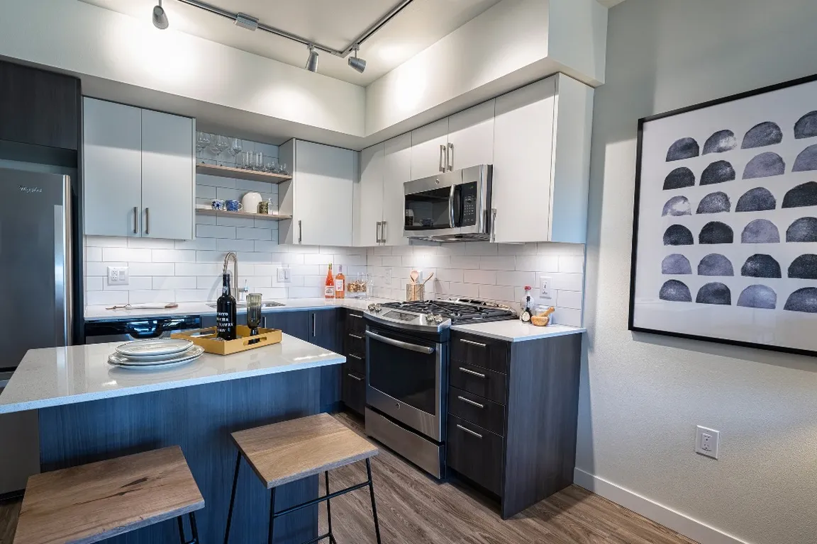 Beautiful finishes include subway tile backsplash
