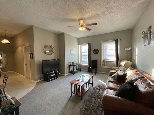 Large open living room facing the street