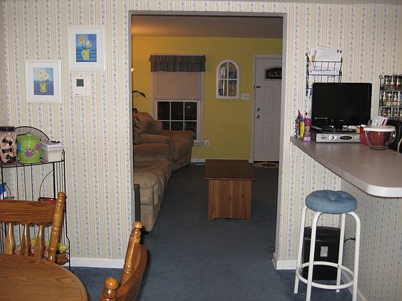 Dining room leading into living room