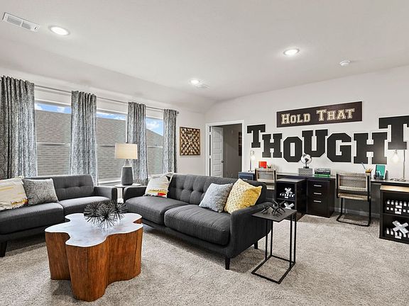 Game room in the Wimbledon home plan by Trophy Signature Homes - REPRESENTATIVE PHOTO
