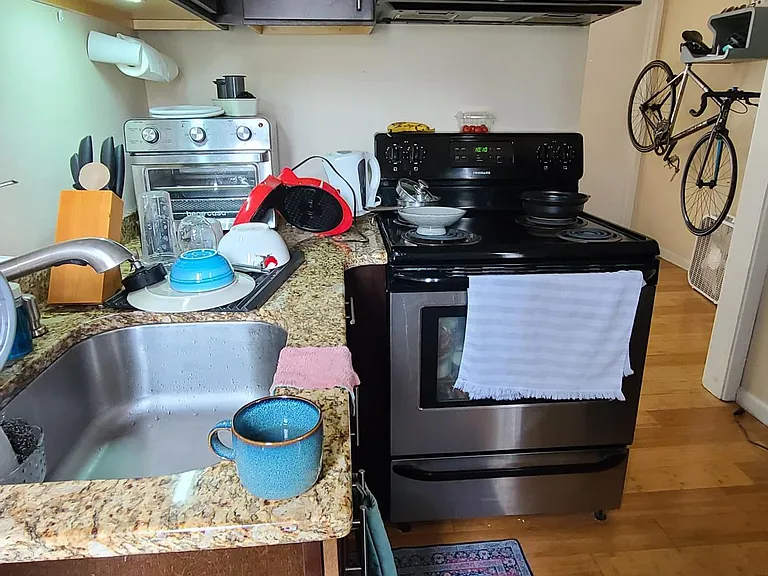 Kitchen with granite counters and stainless steel appliances