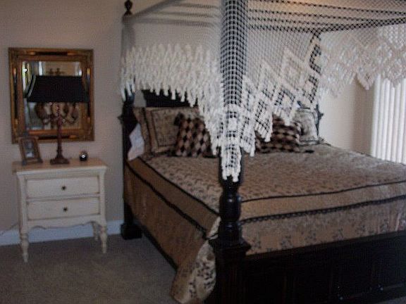 Romantic Master Suite with master bath and walk in closet.