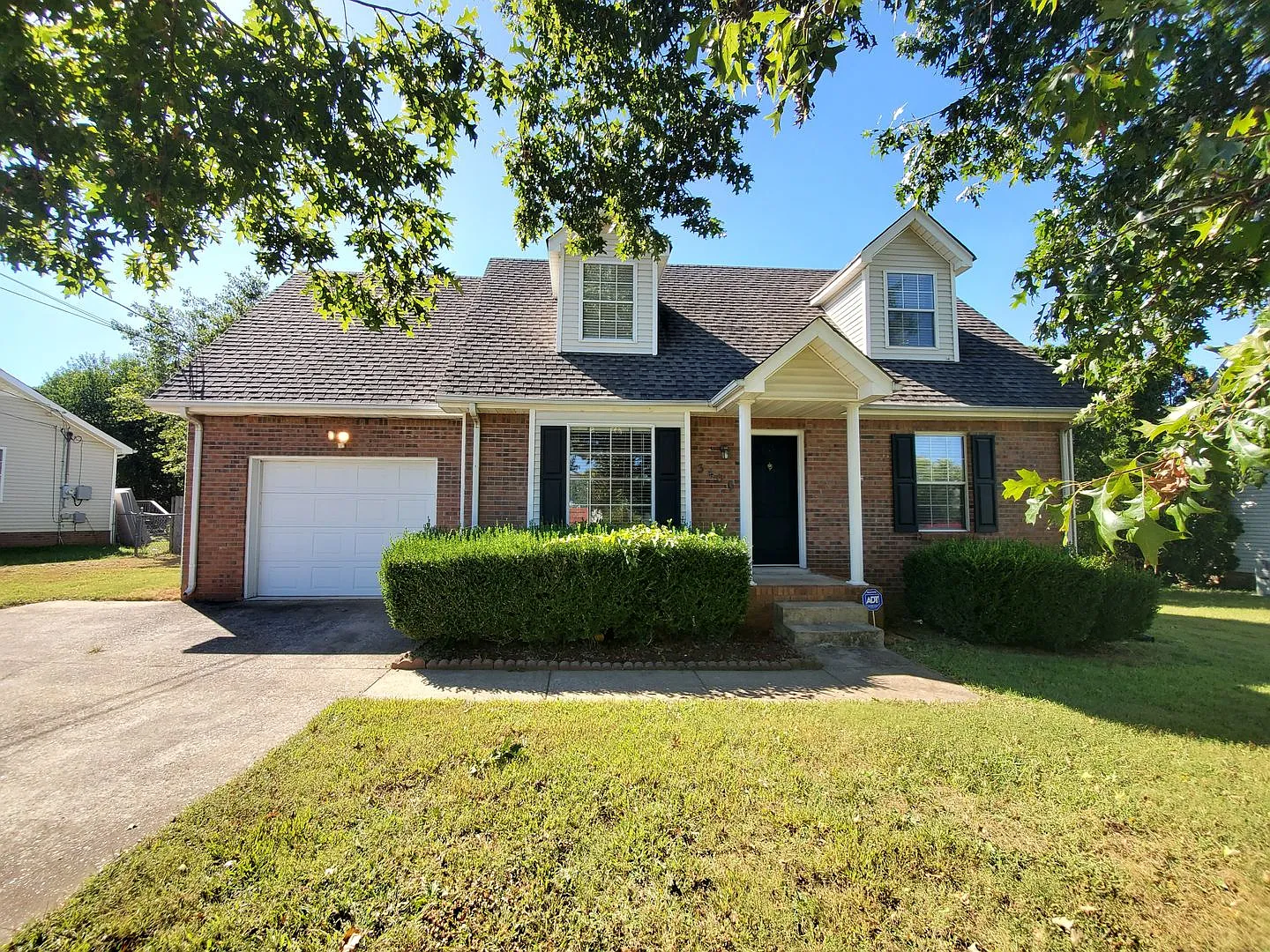 Charming Brick Home Near Westcreek Schools — Photo 1