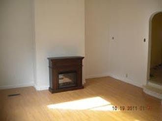 Electric fireplace for ambient mood when the heat is turned off, or convection heat if needed.