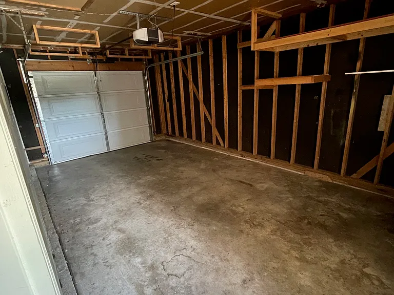 One car garage with plenty of storage.