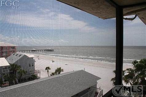 Picture is taken from the screen balcony of this unit.  Fantastic views of the Gulf of Mexico and Fort Myers Pier.