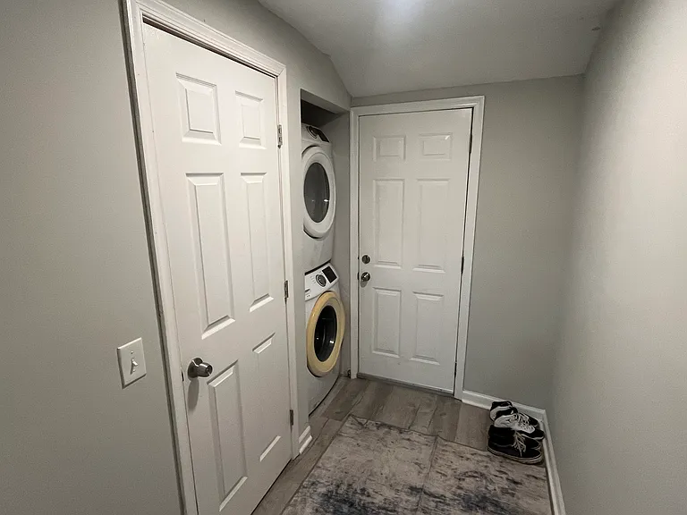 Half Bath closet and Washer Dryer at Back Door laundry room area
