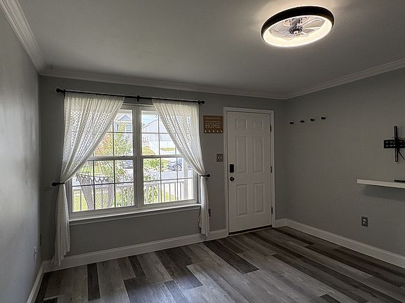 Another View of Living Room w/ Clg Fan Light