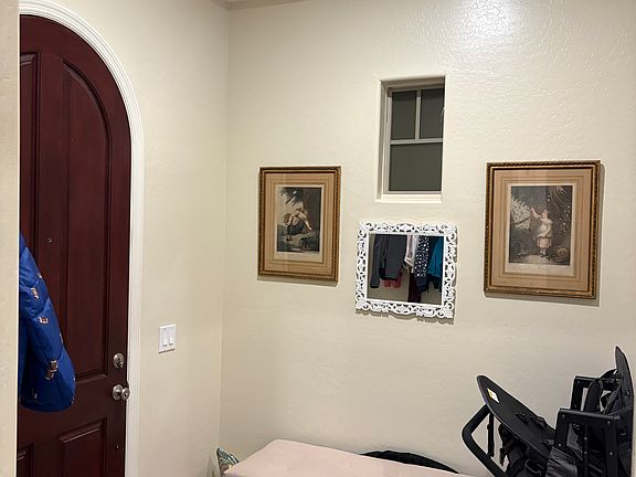 Front Entryway Foyer, Ceiling Vault & 10 foot. Radius top Front Door. 10 foot doors.