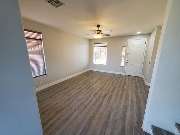 Living Room with Large Windows for Abundant Natural Light.