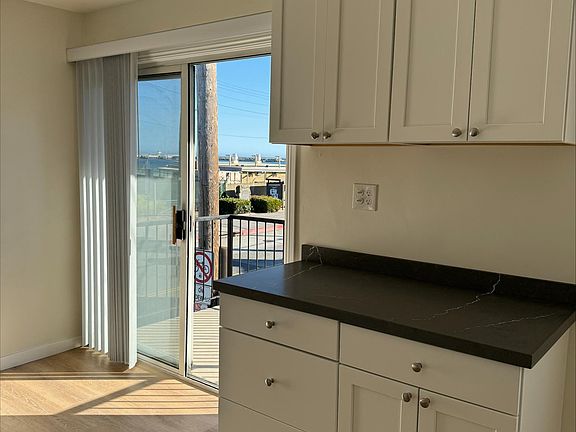 Cabinet in kitchen with access to balcony ... and more water views!