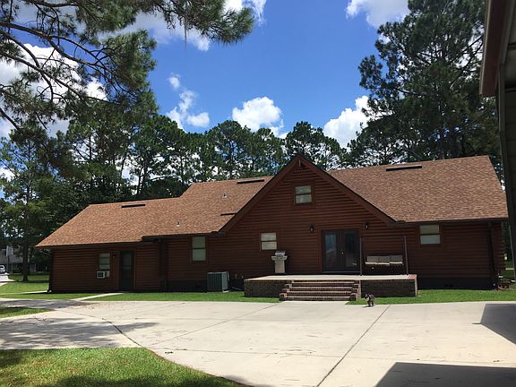 Backside of house with patio