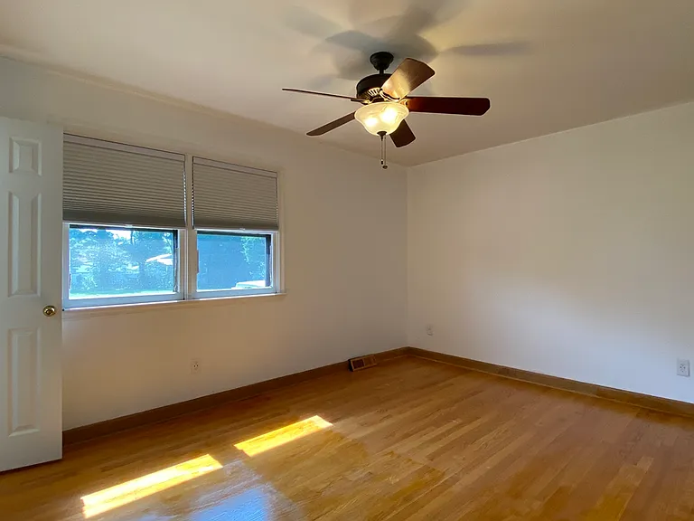 Primary Bedroom w/ Hardwood Floors