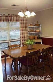 Formal Dining Room
						:
						Plenty of natural light; chair rail; hardwood floors