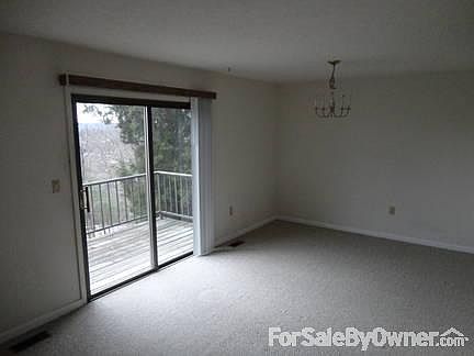 Dining Room - main floor
						:
						Balcony to back yard and scenic views.