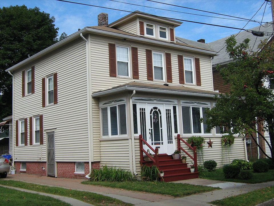 Three season porch. Off street parking for three cars.