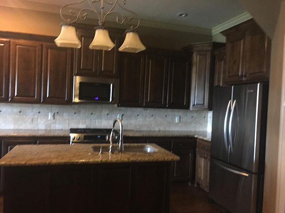 Kitchen, ice maker, wine cooler, gas range