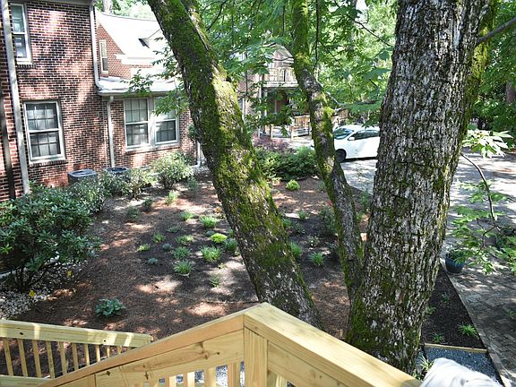 View from front landing of stairs Unit Pecan tree
