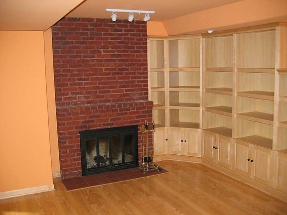 Family room fireplace with custom built ins