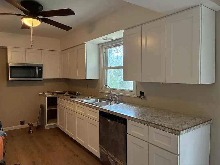 Kitchen just installed as new. New dishwasher and new microwave