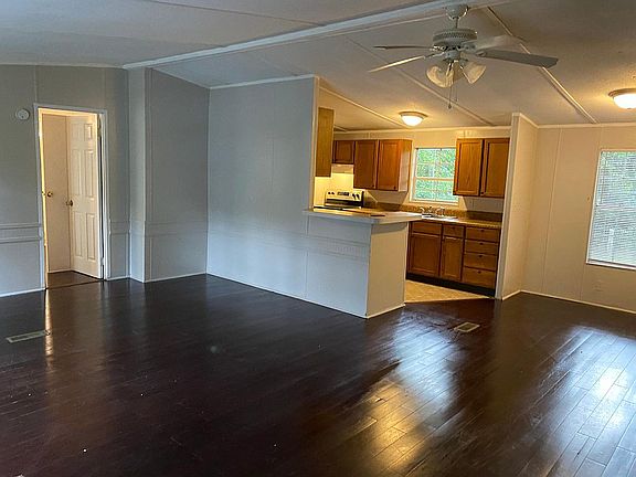 Living room and kitchen with breakfast bar