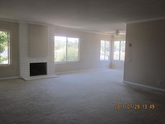 living room, dining room, fireplace