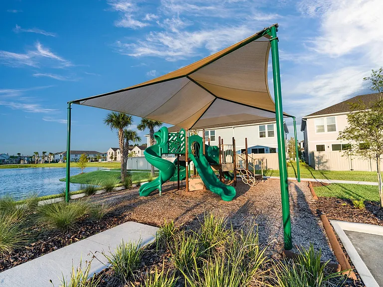A lakeside play area at Amavi Kissimmee offers a relaxed outdoor spot right within our community.