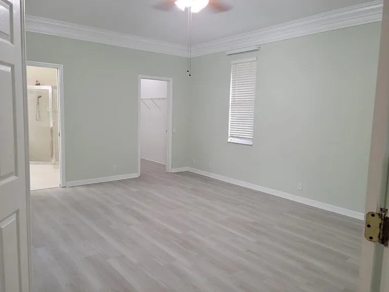 Master Bedroom With New Vinyl flooring