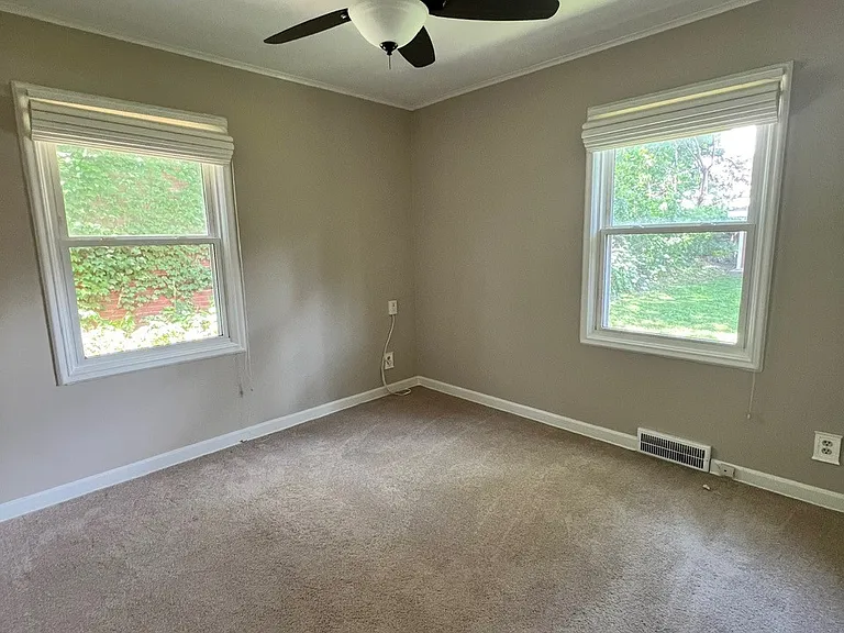 Bedroom #1. Both bedrooms have their own closet and 2 large windows for lots of natural light.