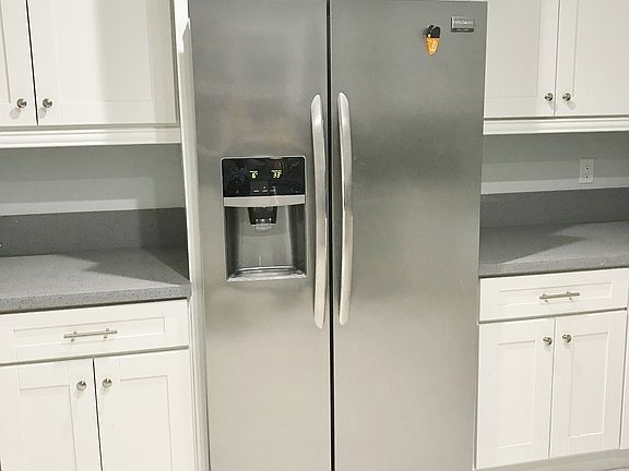 Stainless Steel Fridge Included