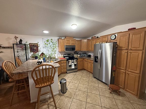 5th image of 14365 E 50th St