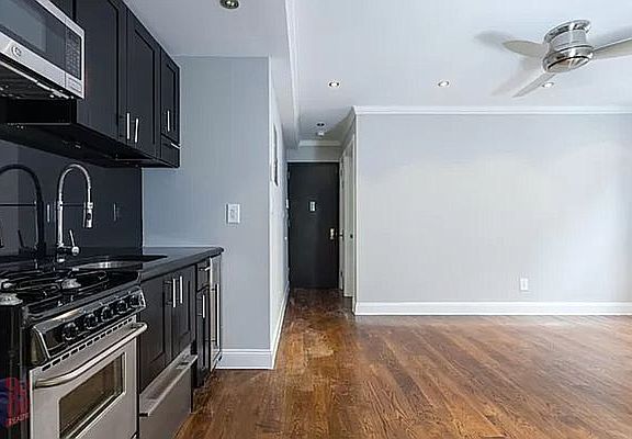 2nd image of 327 E 8th St APT 2B