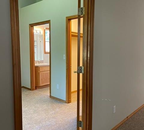 View of bathroom and walk-in closet