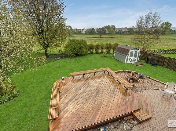 SPACIOUS BACK & SIDE YARD AND OPEN VIEWS BEHIND!