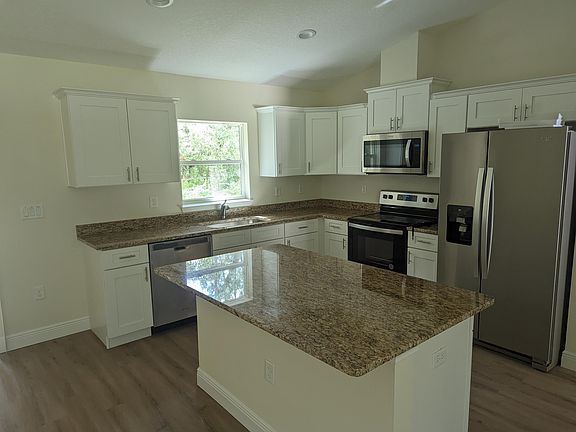 4th image of 10069 N Wayland Ave