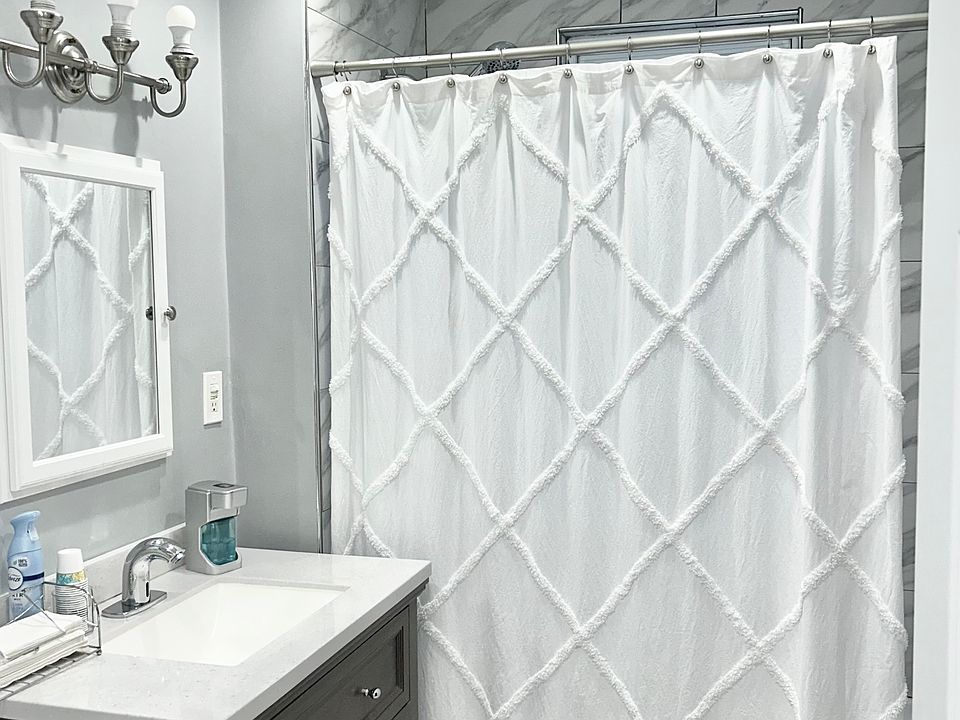 full bathroom, tub and shower