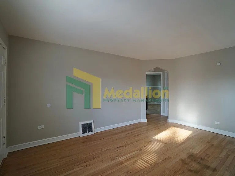 9858 S Drexel Ave — Photo 3