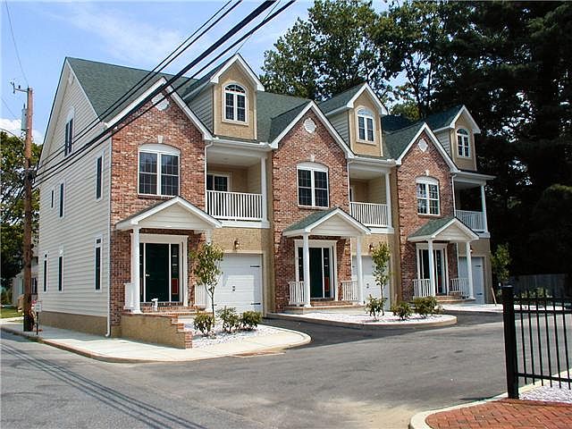 Brick and Stucco Front with 2nd floor balcony