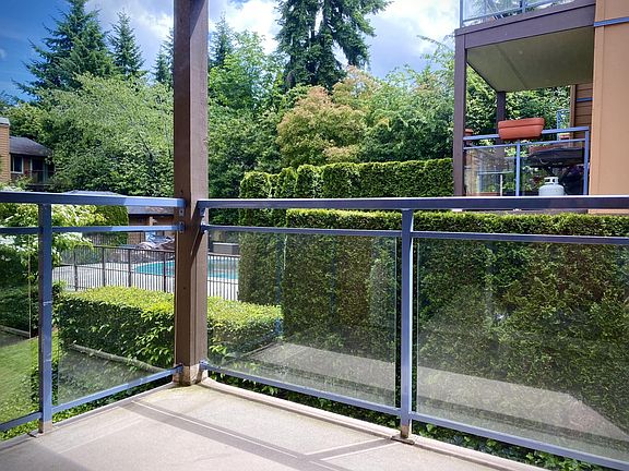 Balcony overlooking pool