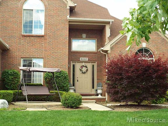 Wait for your kids to come home from school while sitting on your swing or at a bistro table.  A great spot to put a fountain if you so desire!