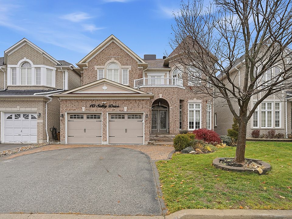 This is a photo of the property during the day. It is beautifully landscaped during the warmer months and is 1 minute from a park.