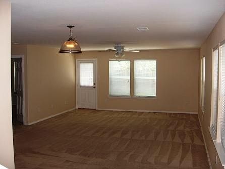 Entry looking across dining living rooms