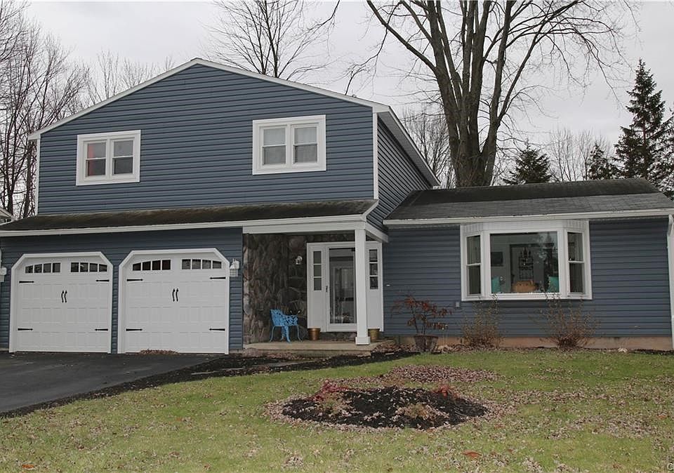 New Viwenco double-hung windows and siding.